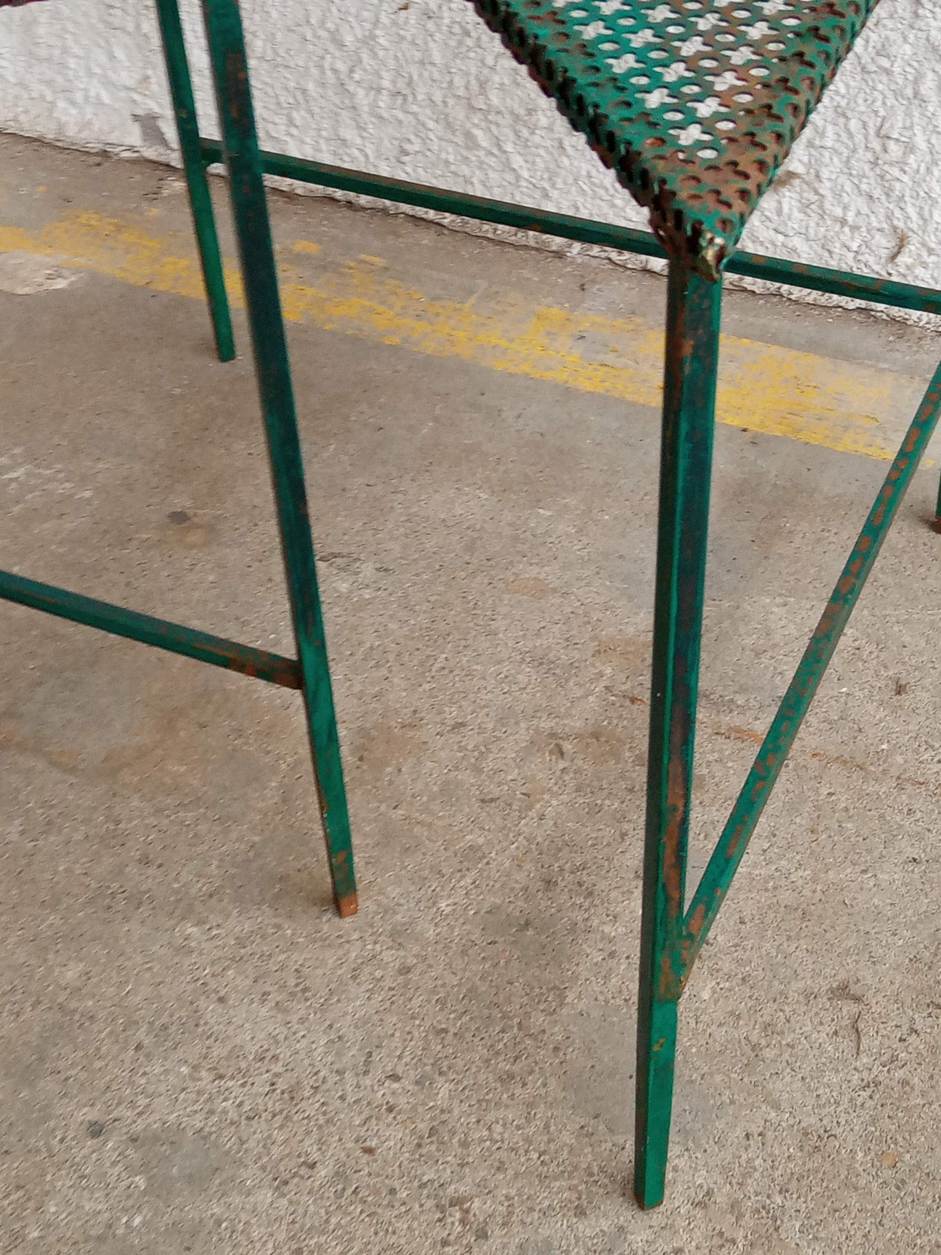 Triangular coffee table in perforated metal Mathieu Mategot