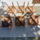 6 vintage 1960s wooden bistro chairs with camel faux leather.