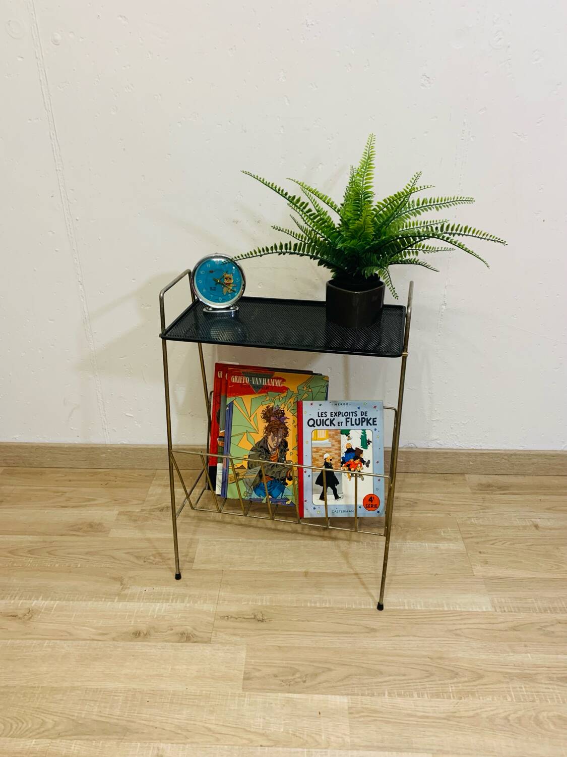 Perforated metal magazine rack