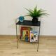 Perforated metal magazine rack