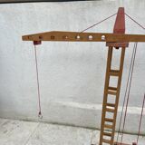 Vintage wooden crane toy from the 60s