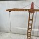 Vintage wooden crane toy from the 60s