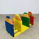 Modular wall-mounted pencil shelf in Pierre Sala style, for children.
