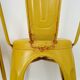 Pair of Tolix Chairs in yellow metal by Xavier Pauchard