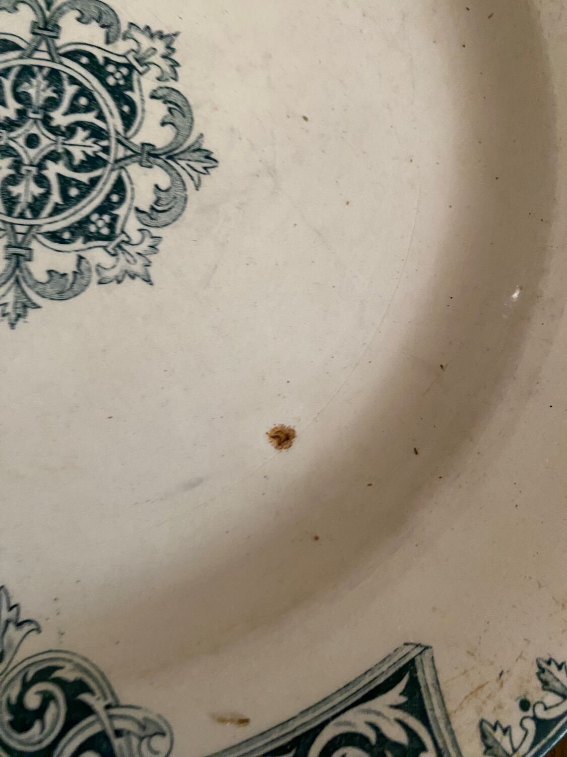 3 mismatched iron earth flat plates in green.