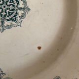 3 mismatched iron earth flat plates in green.