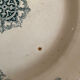 3 mismatched iron earth flat plates in green.