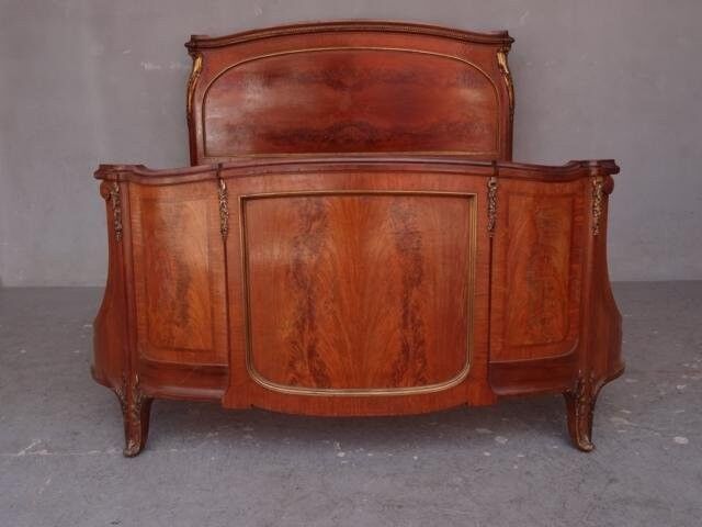 Golden bronze Louis XVI style mahogany bed