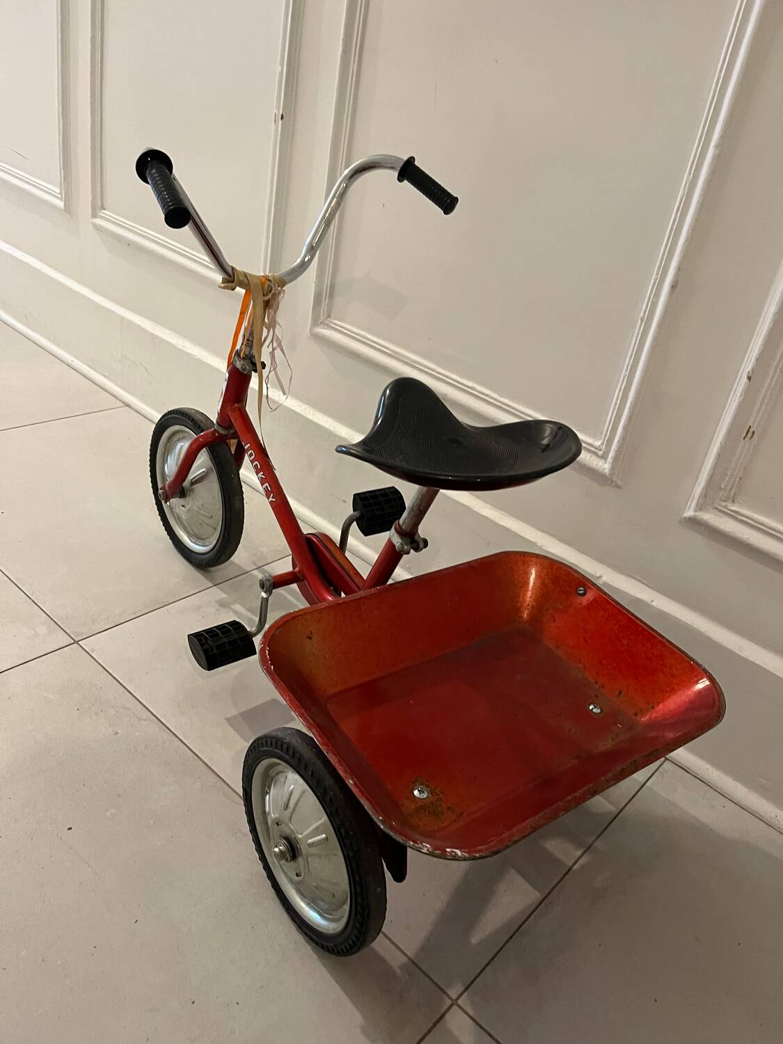 Vintage metal jockey tricycle