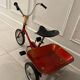 Vintage metal jockey tricycle
