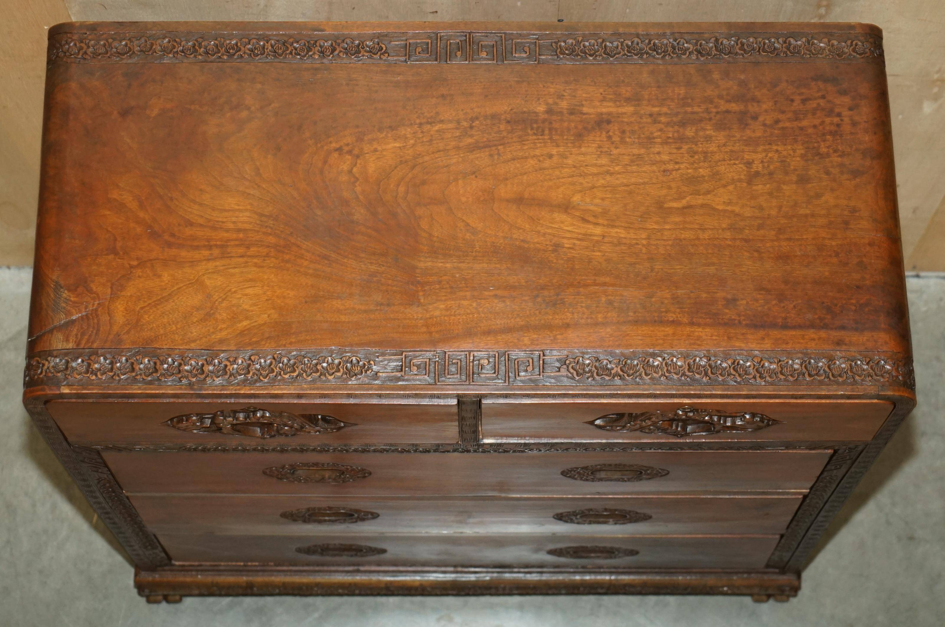 Antique Chinese commode hand-carved circa 1890 with detailed handles.
