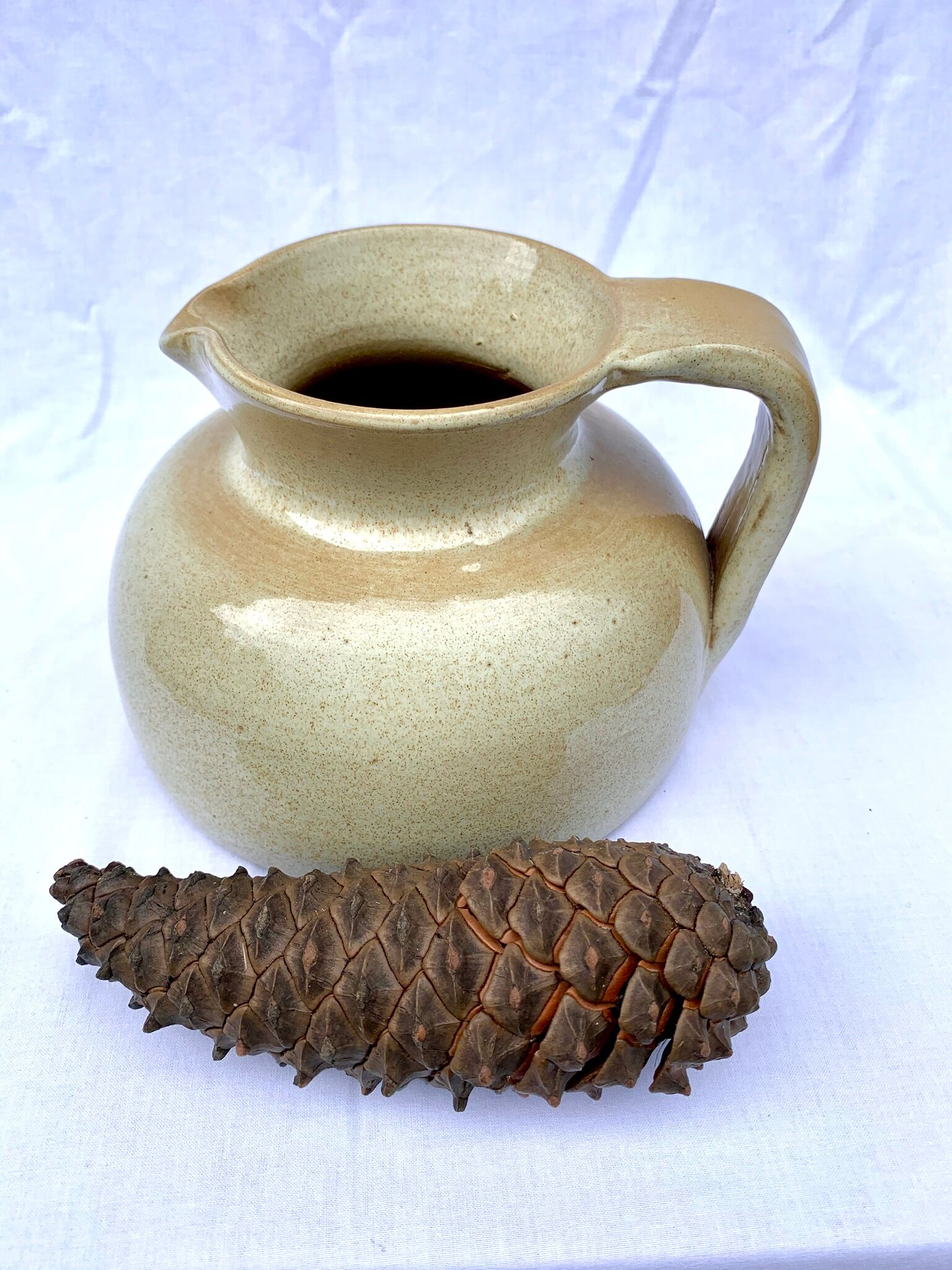 Vintage pitcher in enamelled sandstone