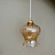 Vintage globe suspension in slightly pearly amber glass