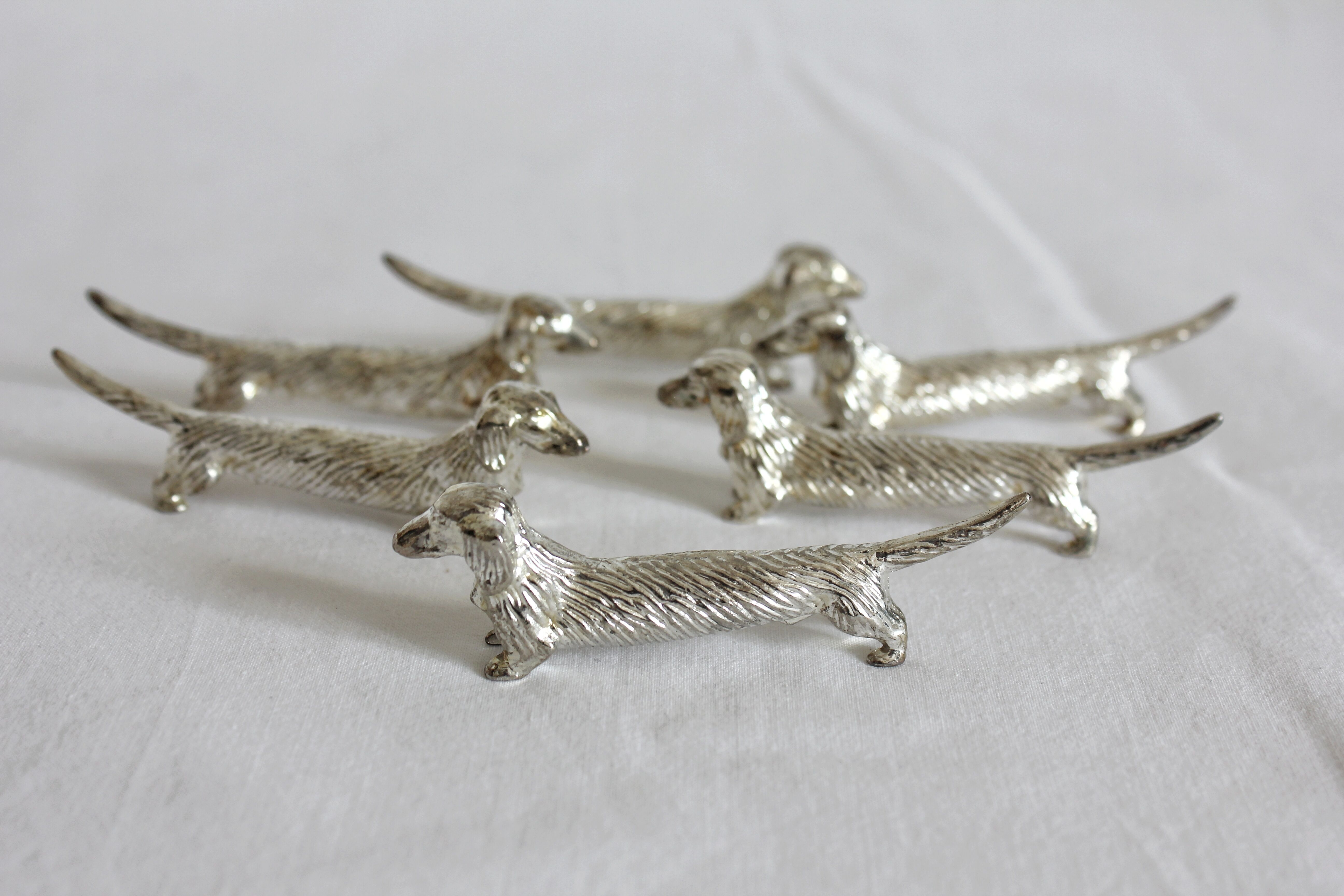 6 dog dachshund knife holders in vintage silver color metal