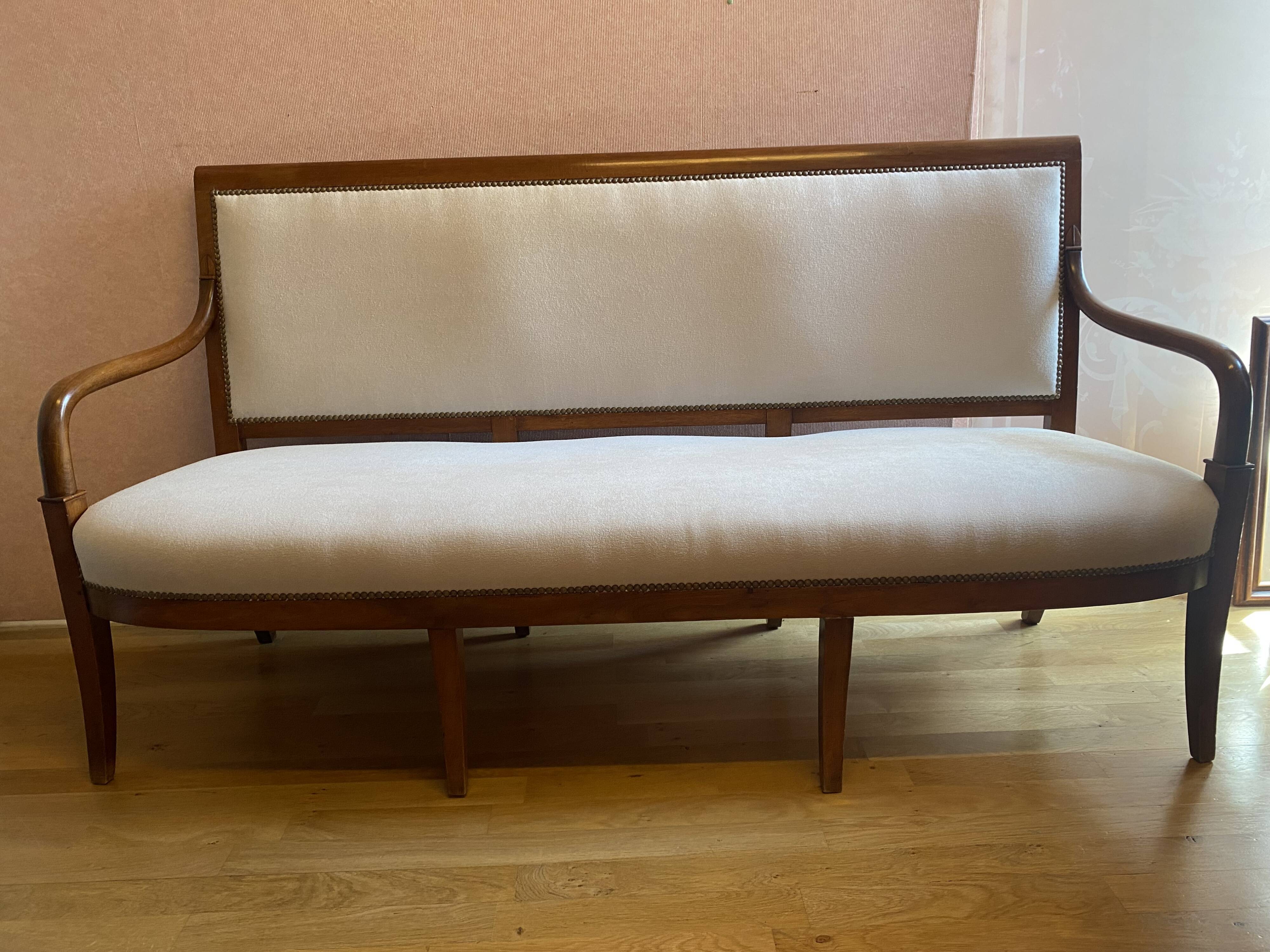 Walnut bench, from the restoration period, covered in white.