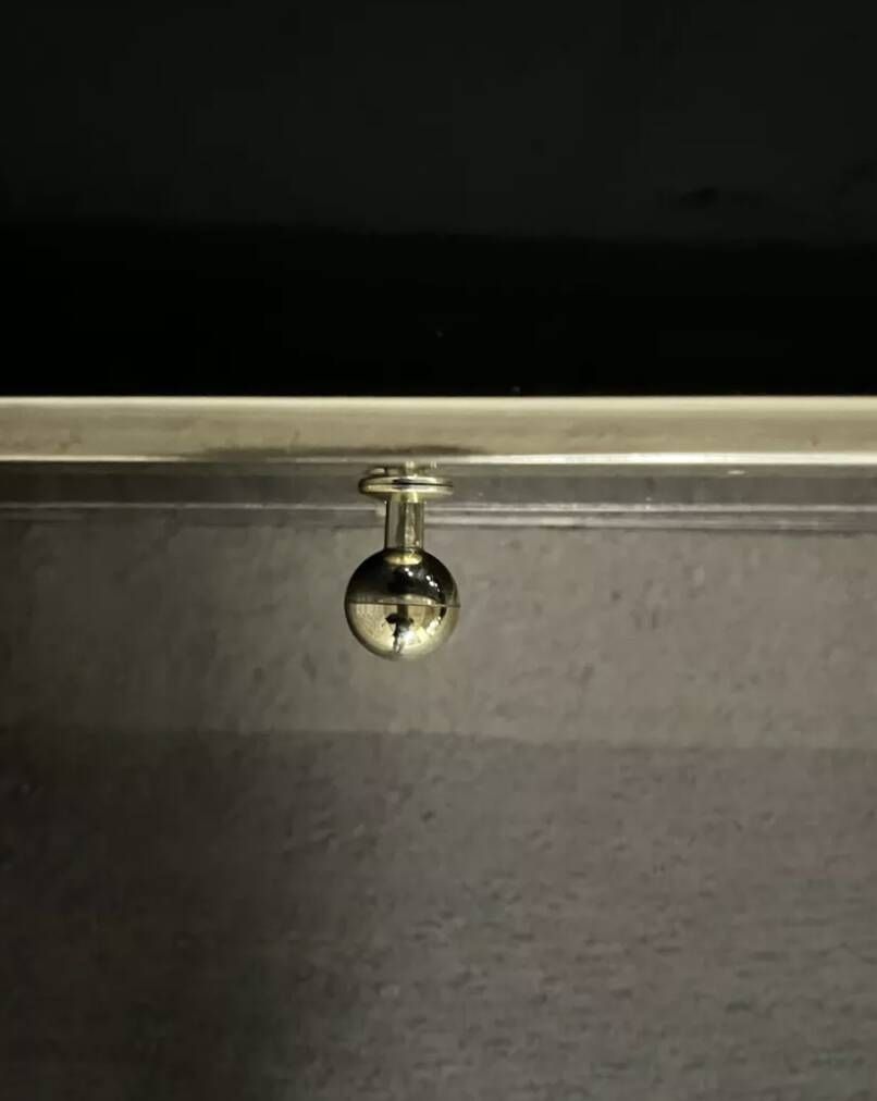 Pair of black lacquered and brass bedside tables, Roche Bobois 1970