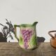 Pitcher in slip - earthenware Saint Clement numbered with fruit and grape basket decoration