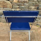 Quartet of blue chairs with design curves