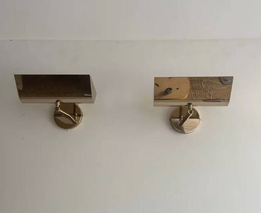 Pair of vintage adjustable solid brass wall lights France 1970