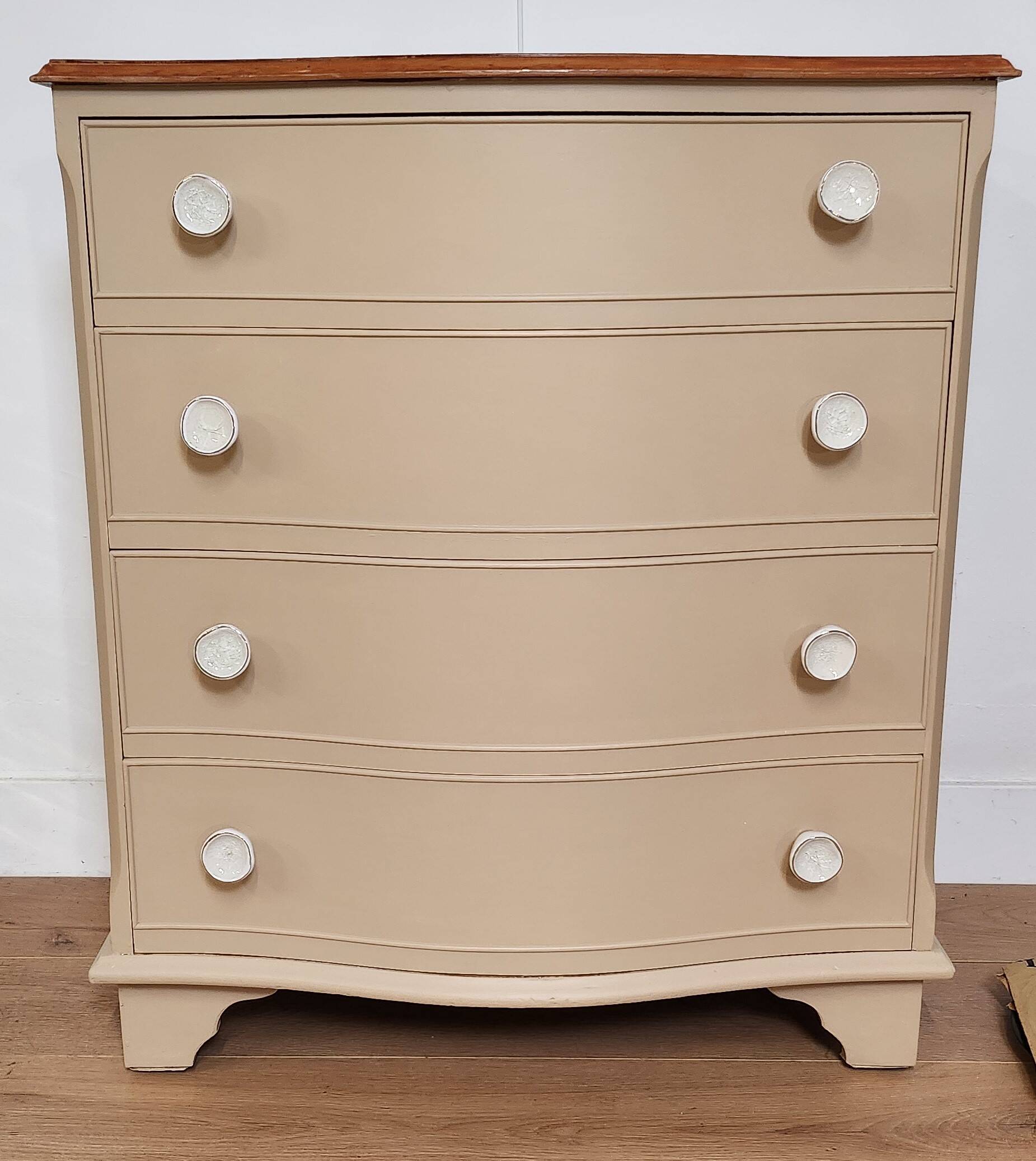 Chest of drawers with rounded front