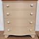 Chest of drawers with rounded front