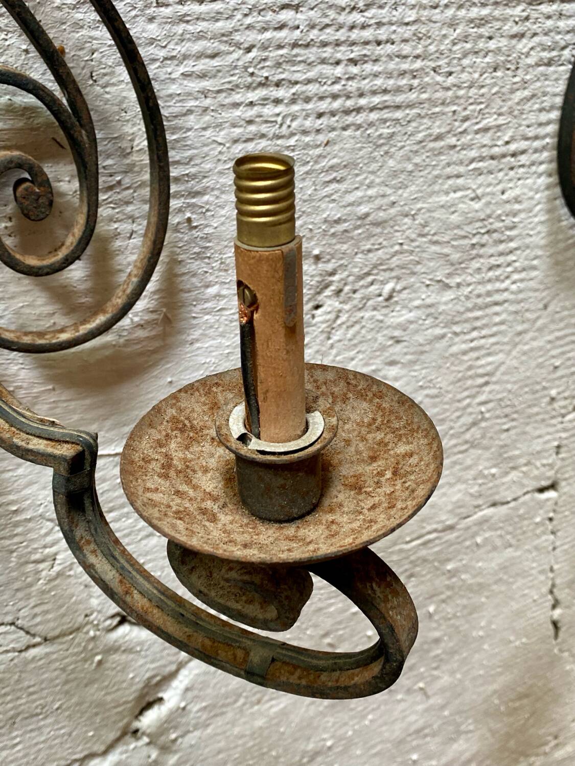 Pair of neoclassical wrought iron wall lights