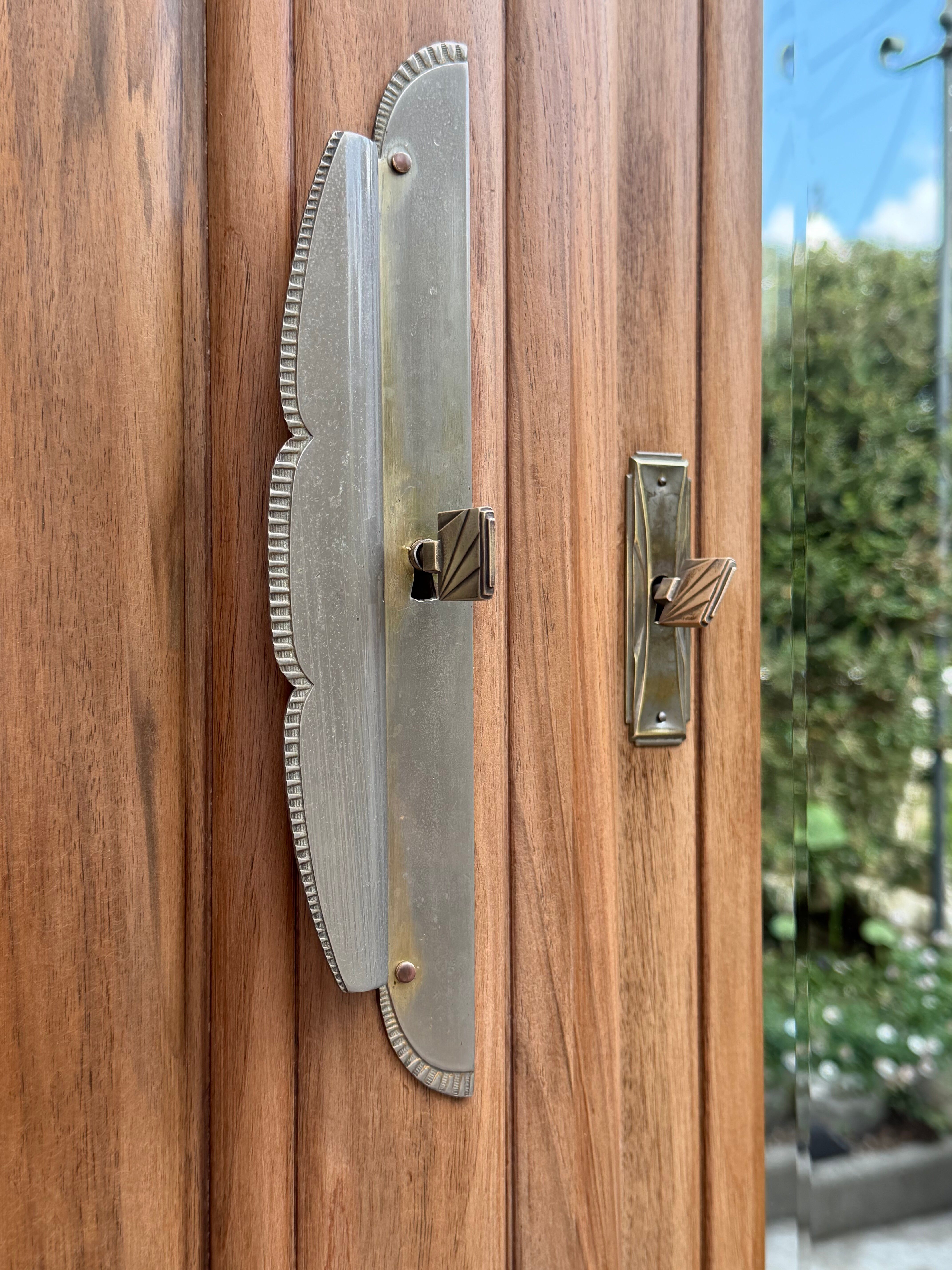 Art Deco wardrobe with bevelled mirror in solid raw walnut.