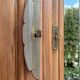 Art Deco wardrobe with bevelled mirror in solid raw walnut.