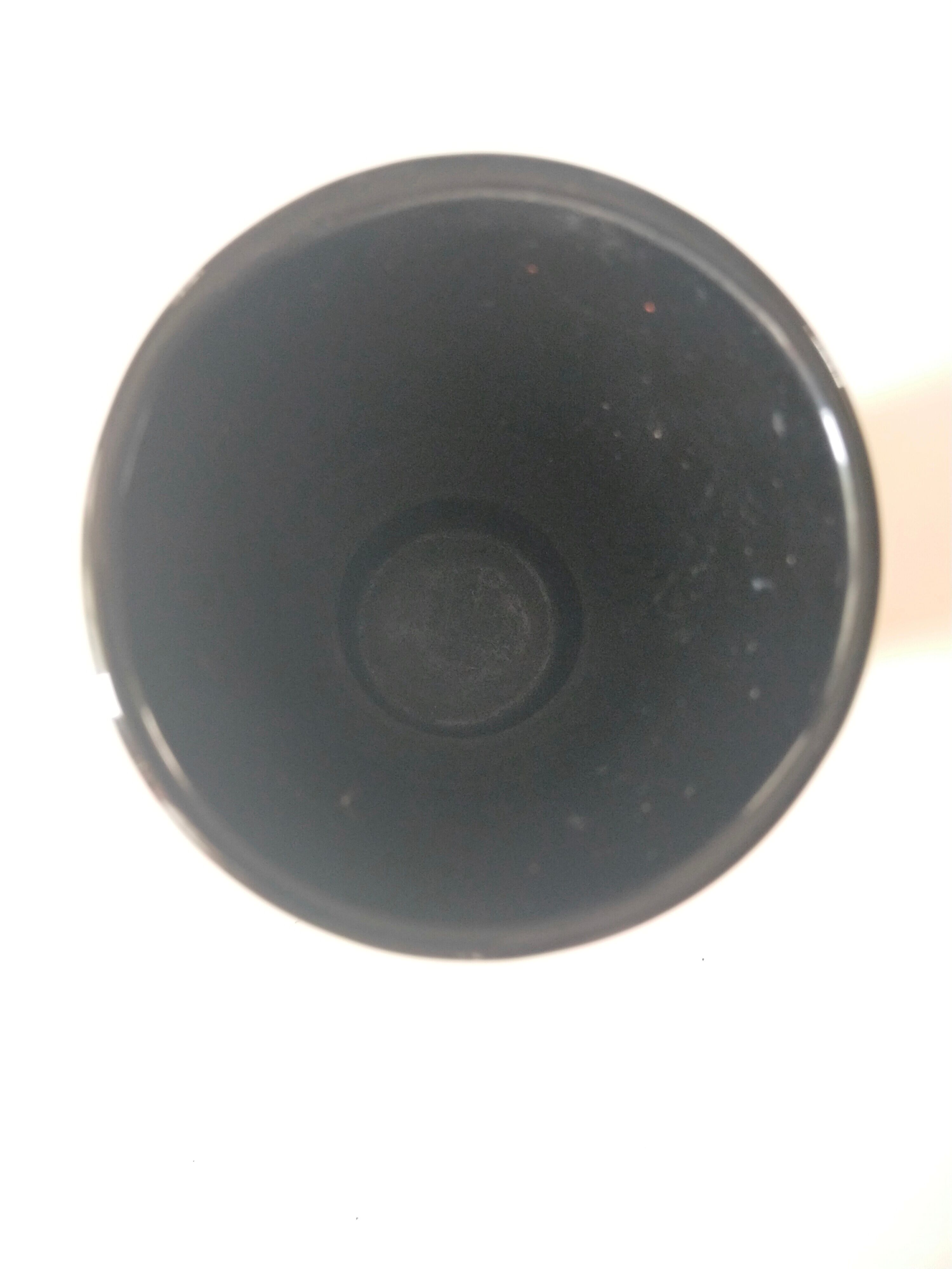 Longwy, Louis Valenti Black vase decorated with tiger lilies in polychrome enamels