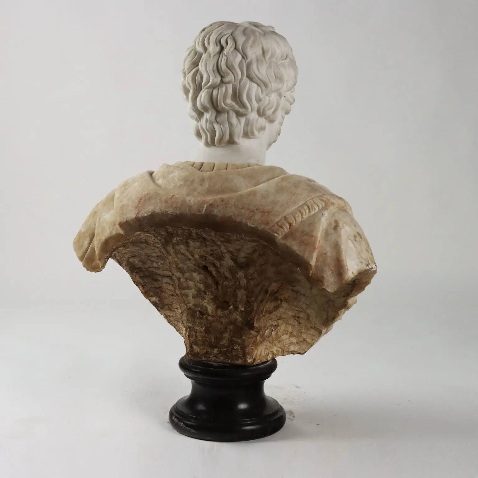 Bust of a Roman emperor in white marble, Italy, 20th century.