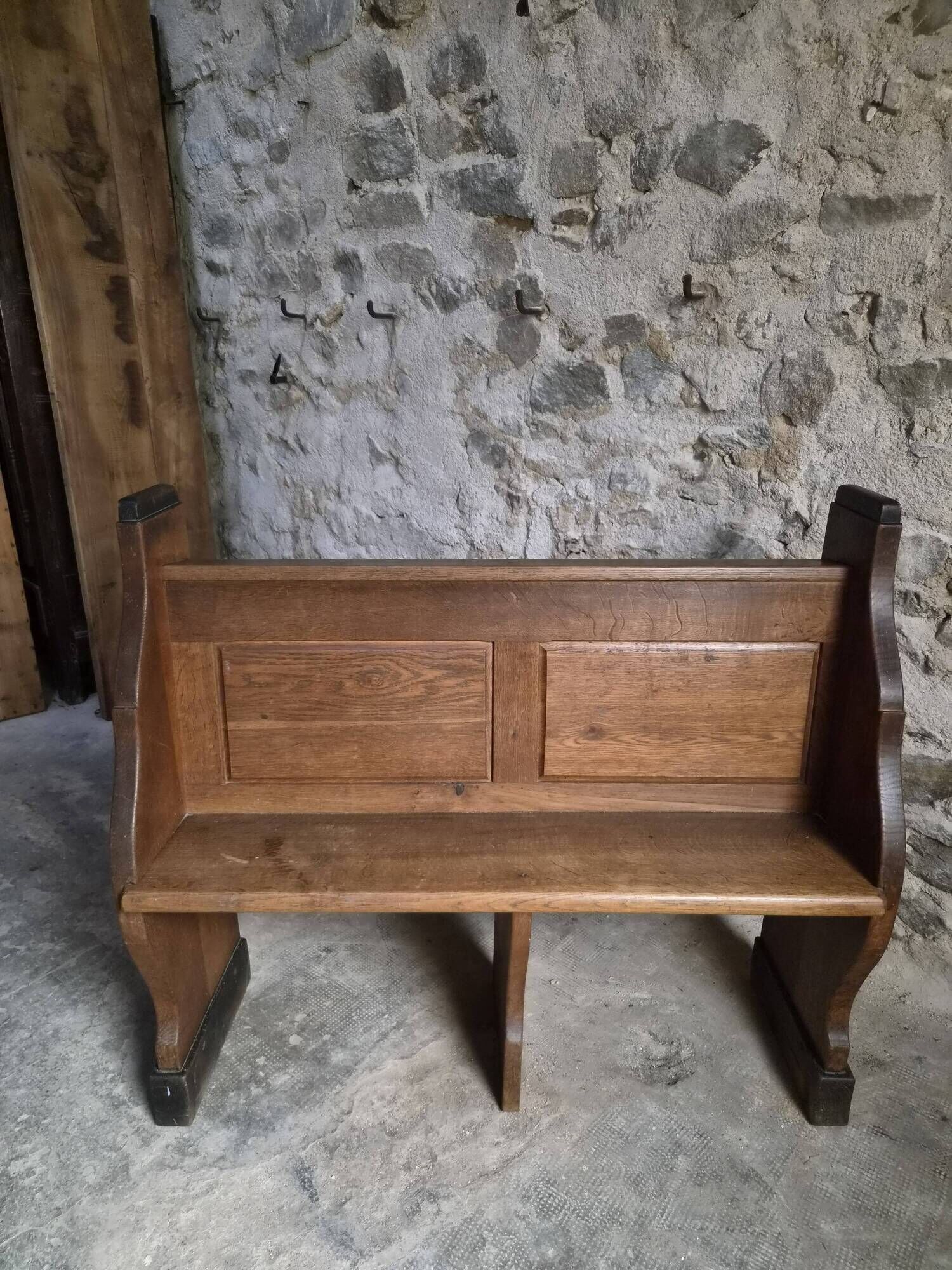Antique church bench in oak, circa 1900–1920