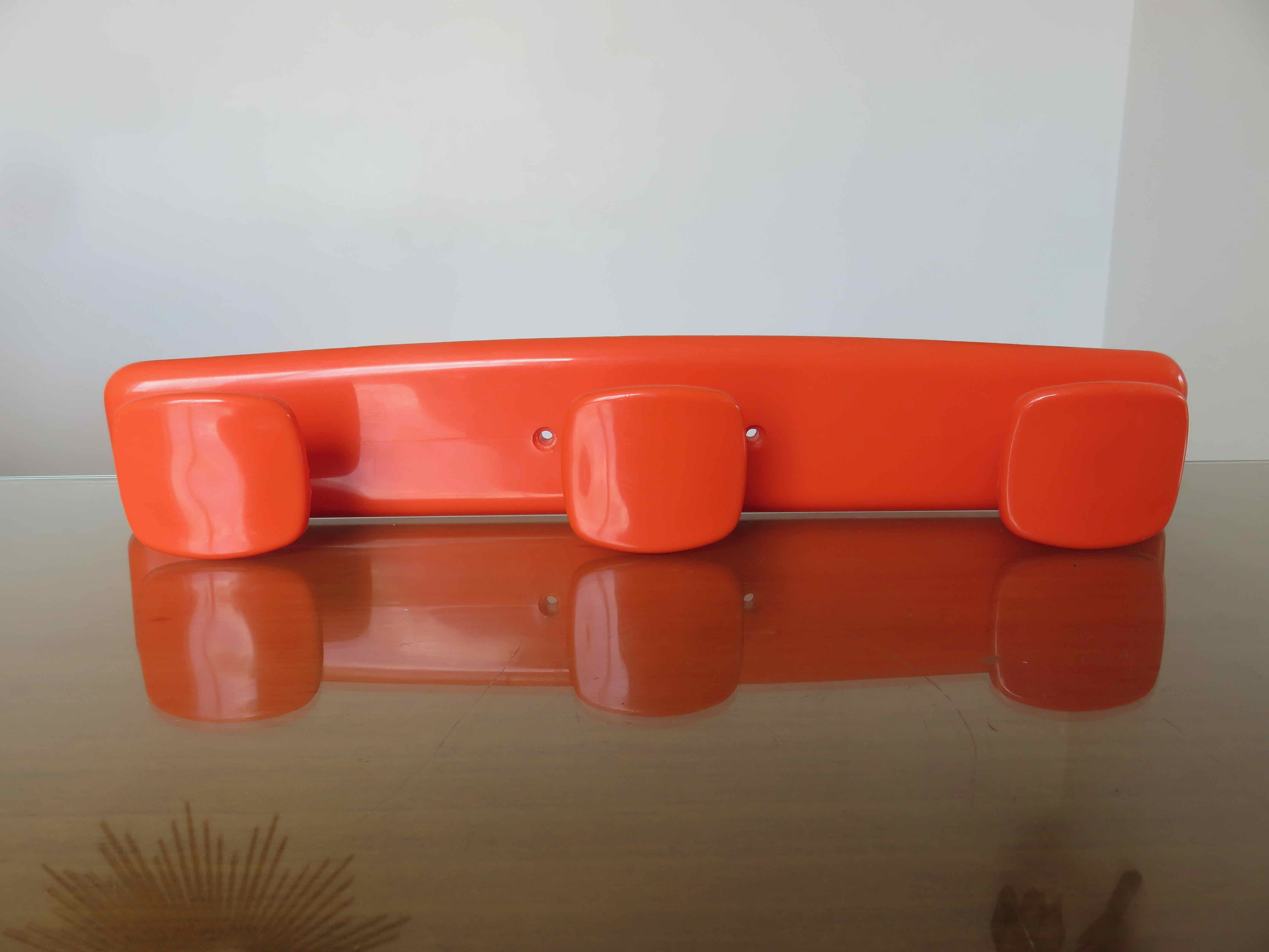 Orange plastic wall coat rack "syla" france 1970