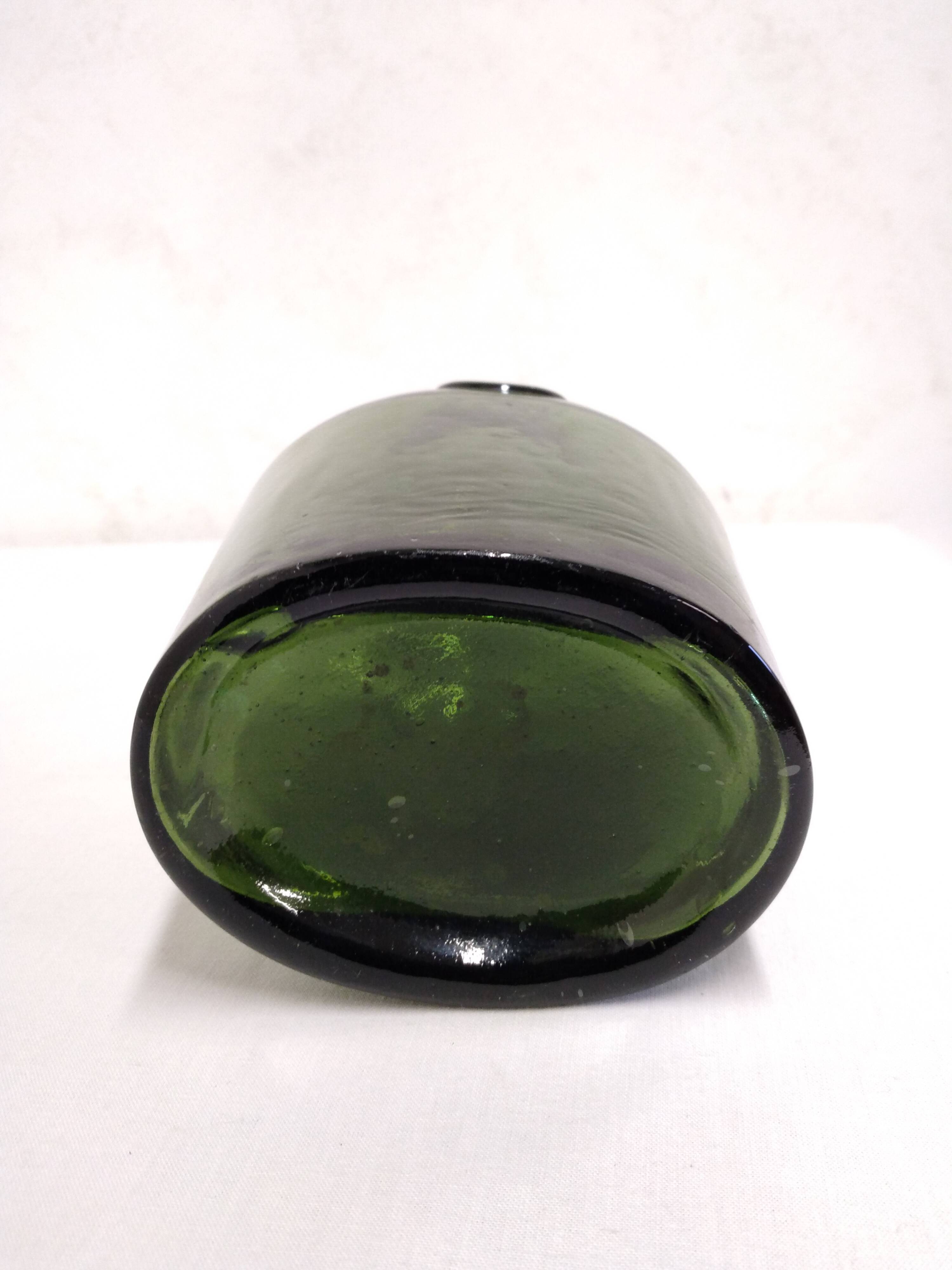 Old blown glass bottle