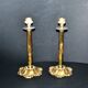 Lot of 2 antique brass and gilded bronze candle holders with acanthus decoration.