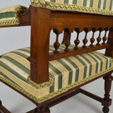 Neo-Renaissance walnut armchair with lion heads, circa 1880