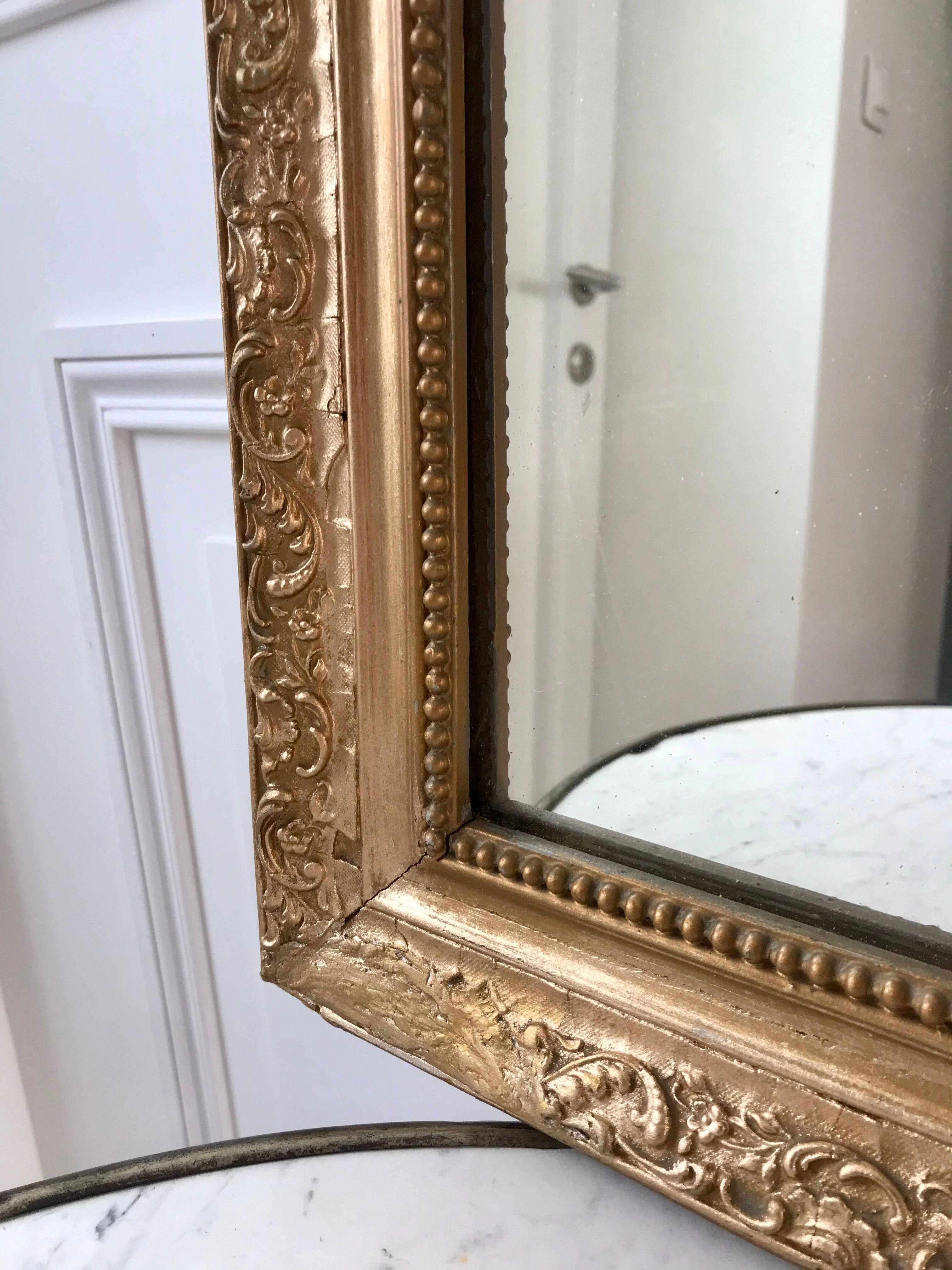 Wooden mirror and gilded stucco early twentieth century