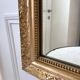 Wooden mirror and gilded stucco early twentieth century