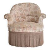 Fauteuil crapaud beige motifs floraux à franges