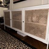White wooden sideboard and canning