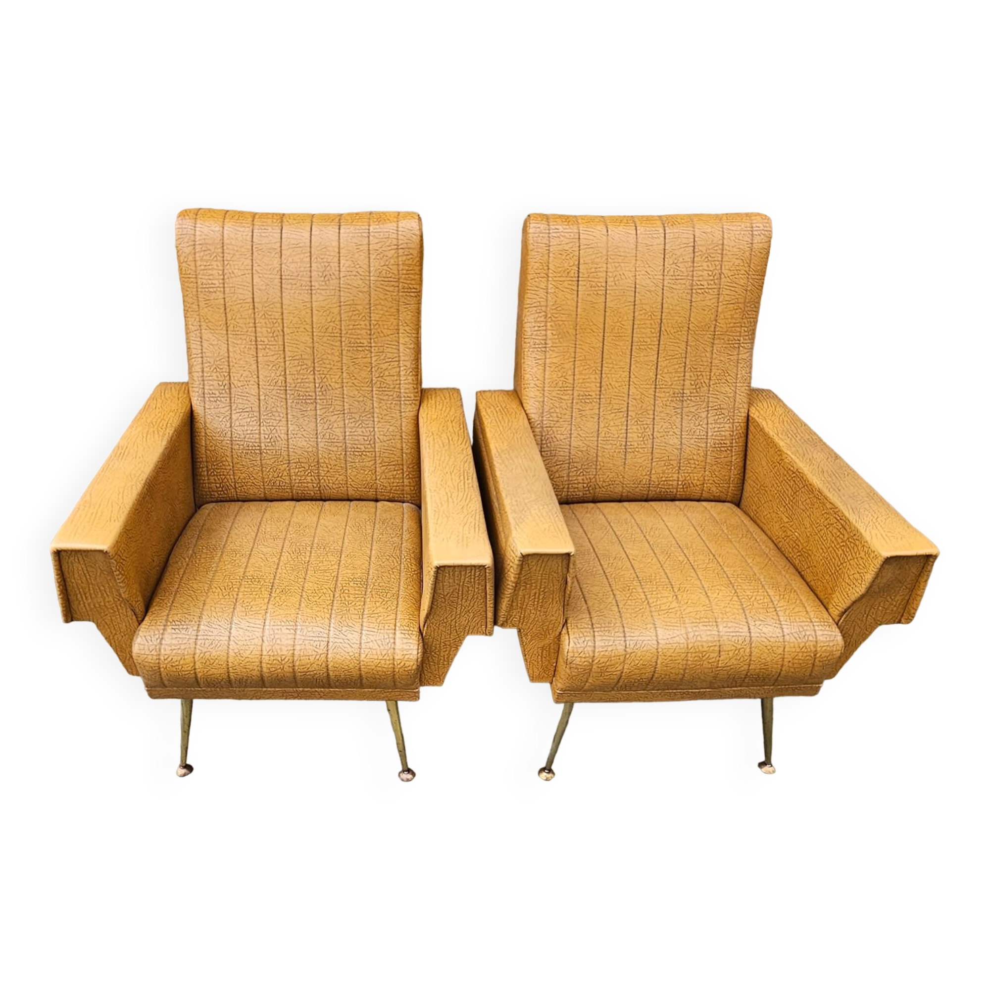 Pair of mustard skaï armchairs, brass feet