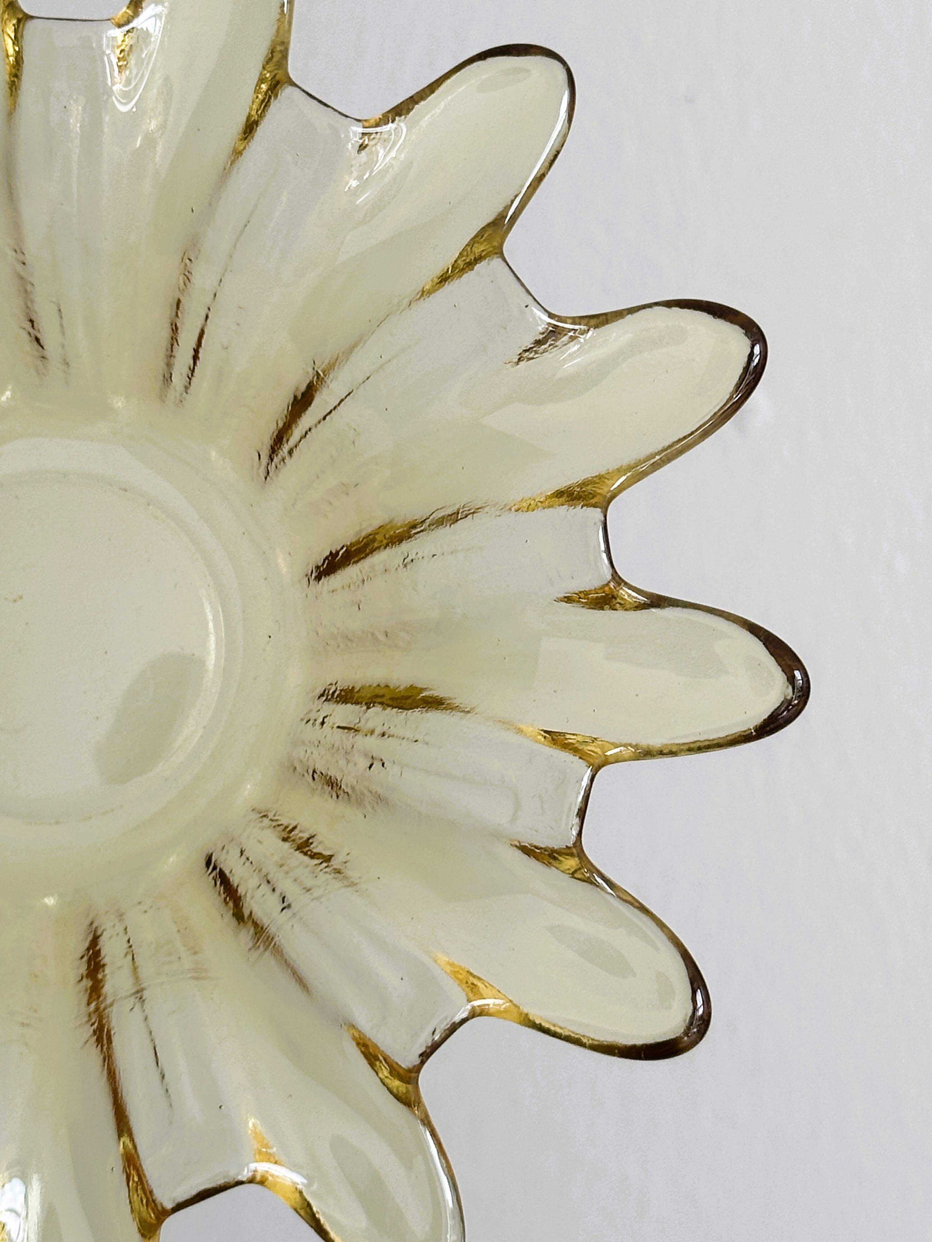 Yellow translucent blown glass pocket emptier