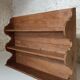 Old wall shelf in raw wood