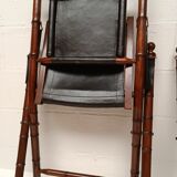 Pair of vintage "safari" folding armchairs in mahogany and leather