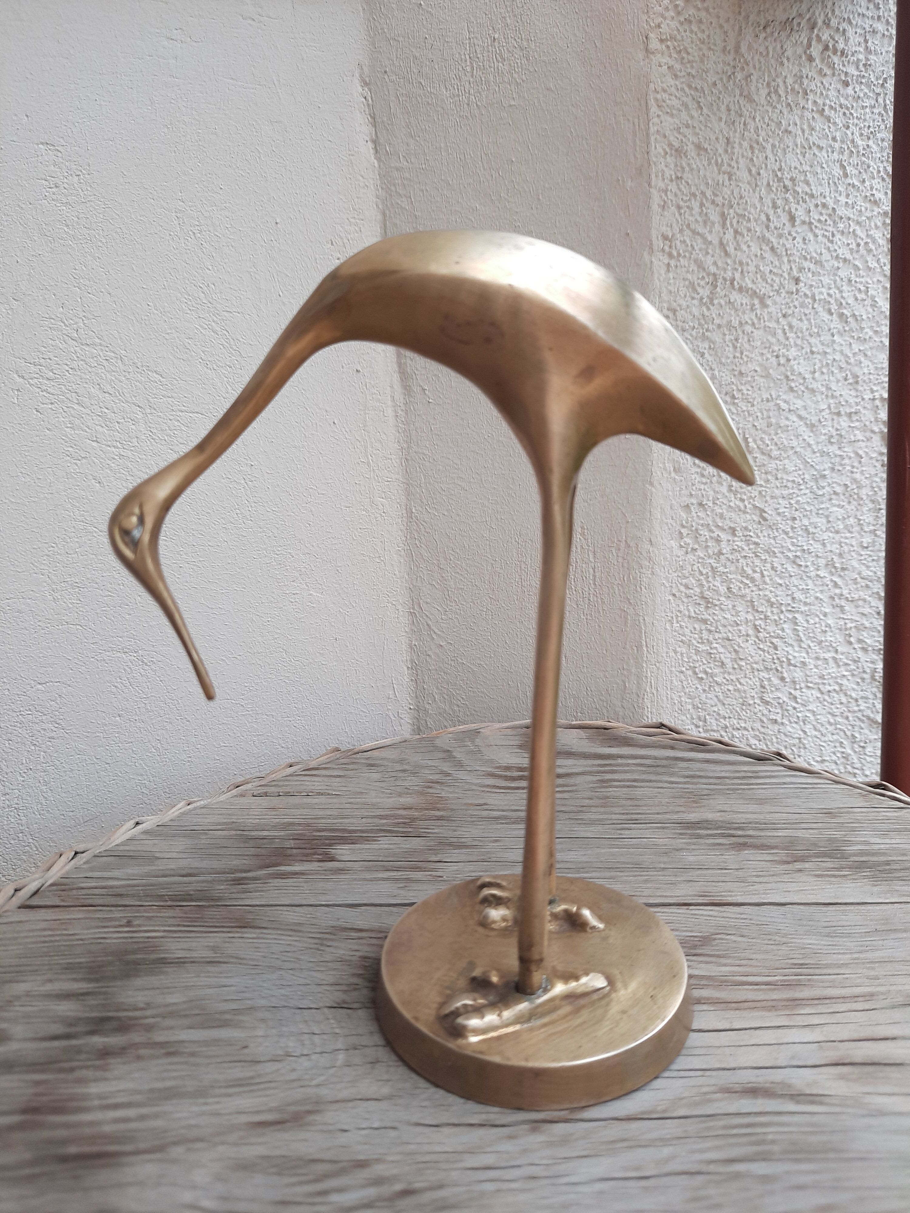 Vintage brass heron