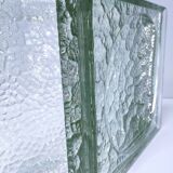 Two designer glass paving pockets