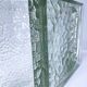 Two designer glass paving pockets