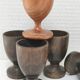 Set of twelve turned wood shells and vintage aluminum