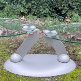 Naos designer coffee table in tempered glass and cast iron