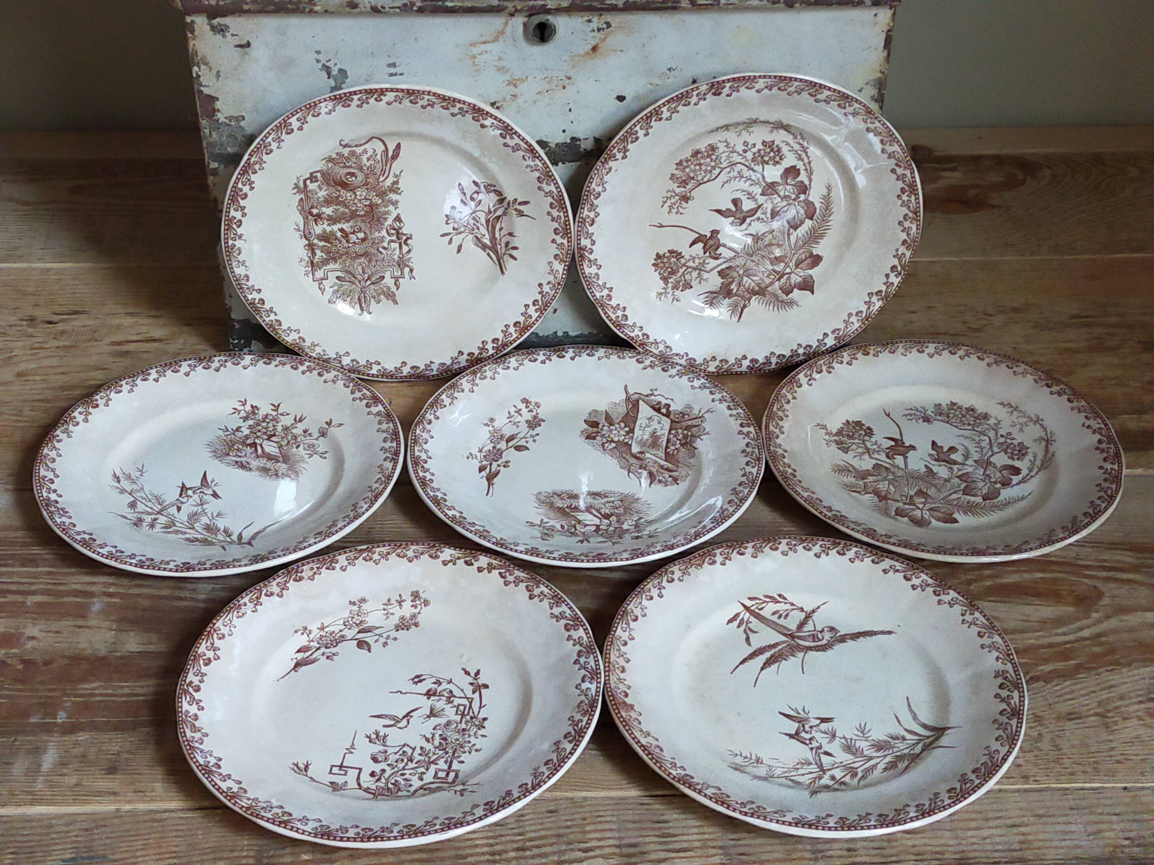 Seven iron earth dessert plates with birds ffPexonne late 19th century