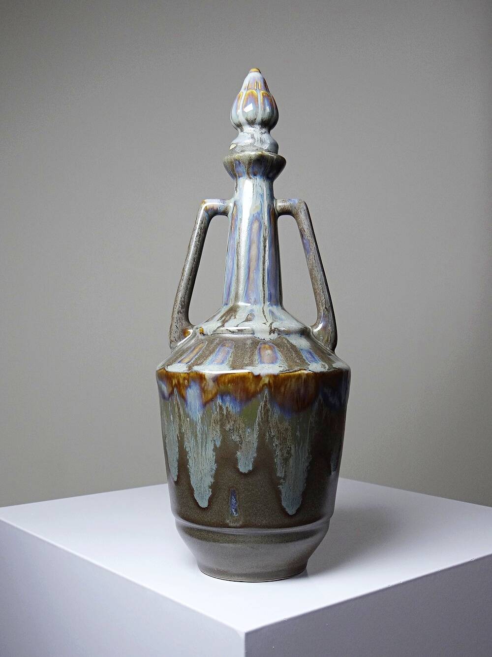 Vintage stoneware bottle with flamed glaze, France 1950-1970.